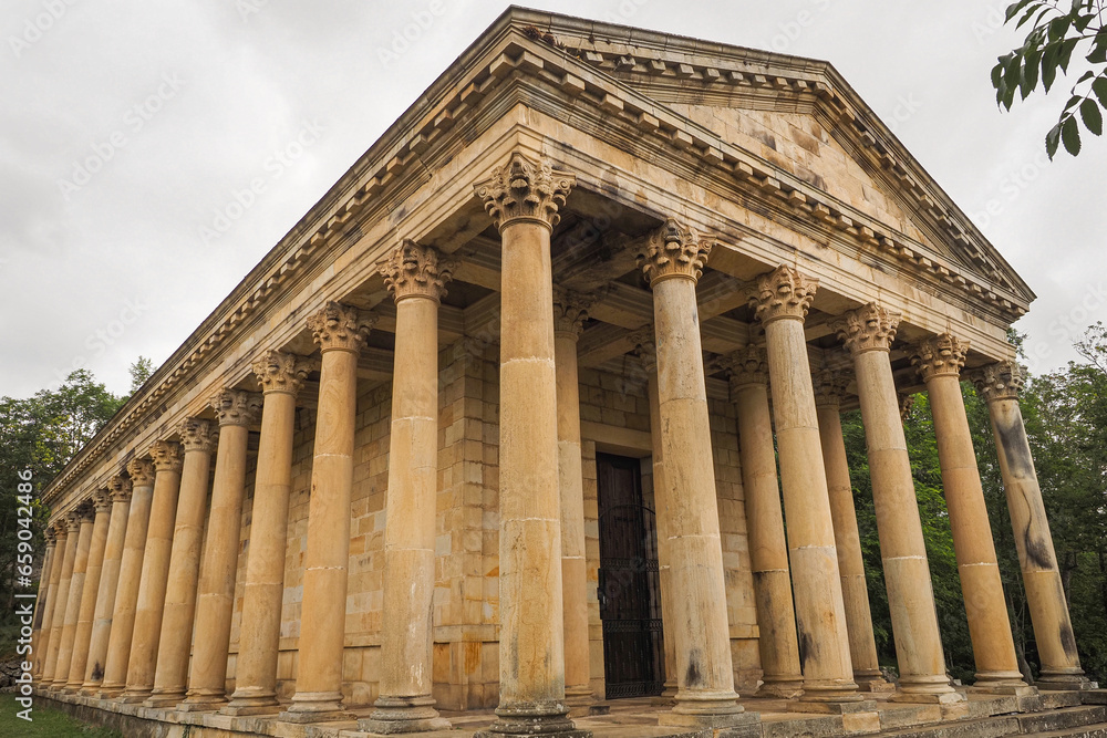 Neoclassical architecture. Catholic sanctuary Parthenon of Las Fraguas or church of San Jorge, looks like Greek temple with a total of 40 columns around the building. Arenas de Iguña, Cantabria, Spain