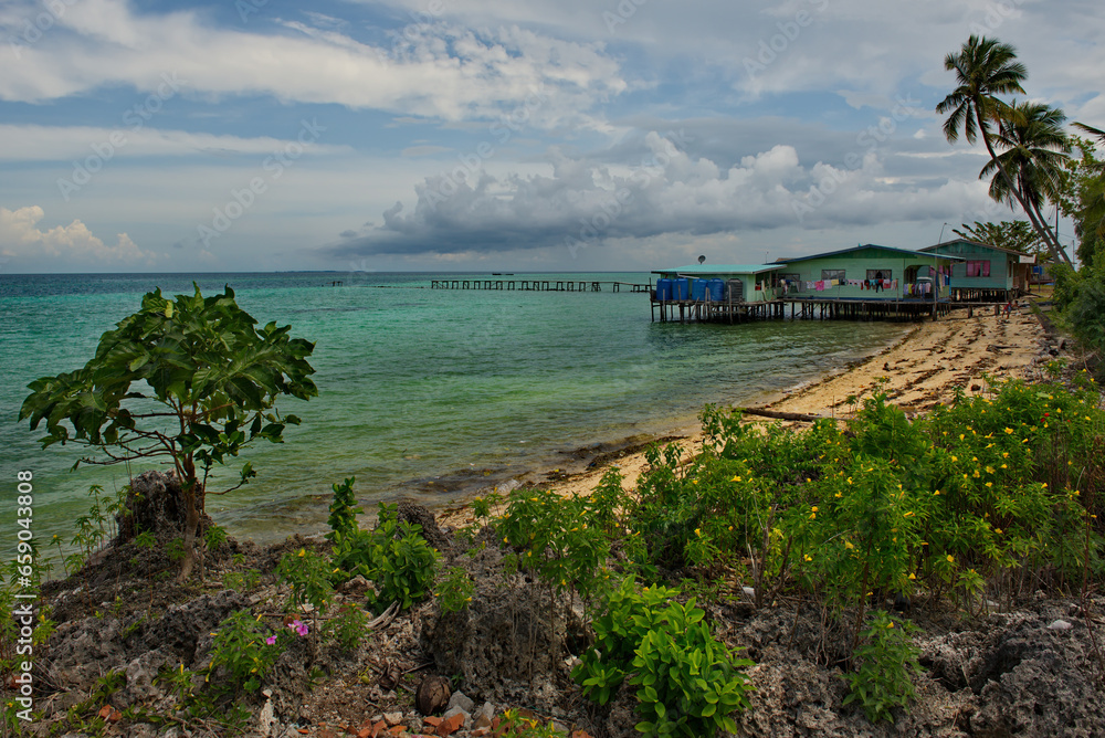 Malaysia. The coast of one of the many reef islands along the east coast of Borneo.