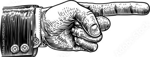 A hand pointing a finger in a direction sign. Wearing a business suit in a vintage antique engraving woodblock or woodcut style.