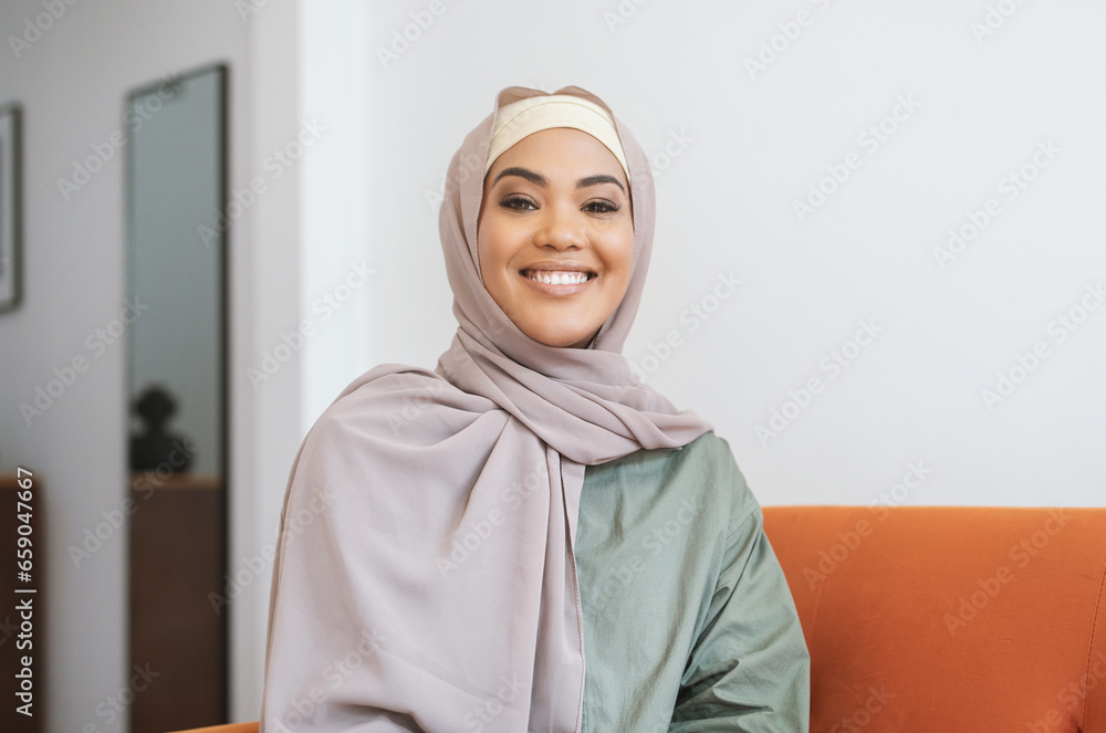 Portrait Of Happy Muslim Woman In Hijab Posing At Home