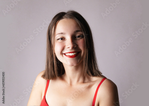 Beautiful smiling woman with clear skin  natural makeup and white teeth