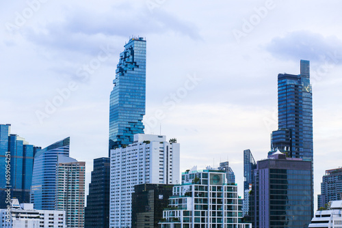 view of Mahanakhon building and other high building in Thailand on the sunny day