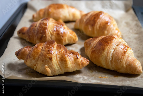 Fresh croissants just out of the oven. © pjjaruwan