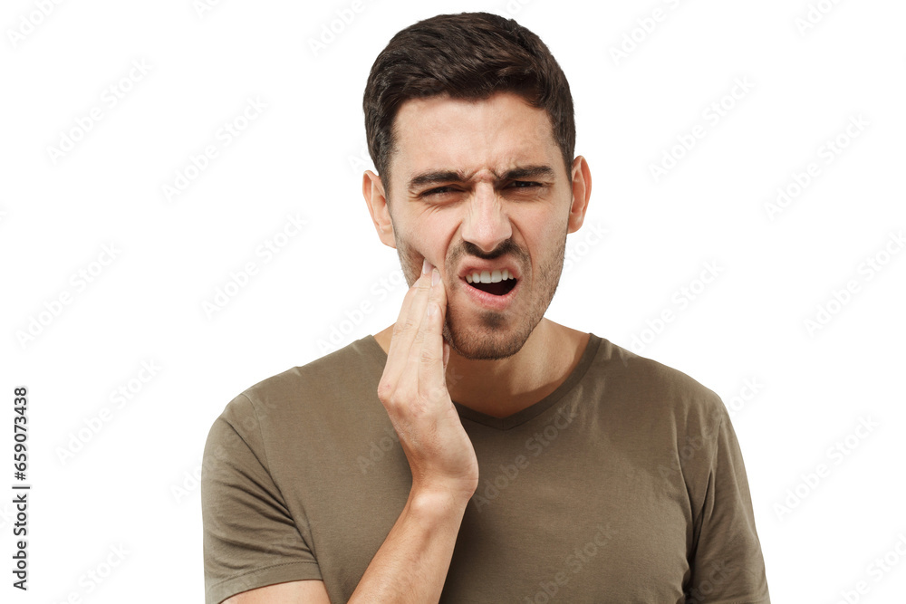 Young man feeling tooth pain, holding his cheek with hand, suffering from toothache Young man feeling tooth pain, holding his cheek with hand, suffering from toothache
