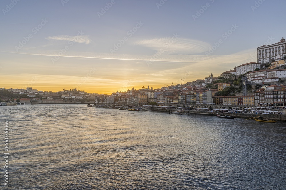 Sunset over the Douro river in Porto
