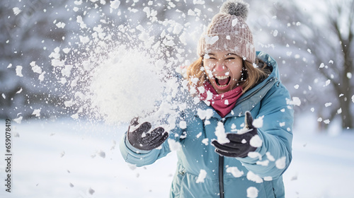 Woman tries to catch a massive snowball 