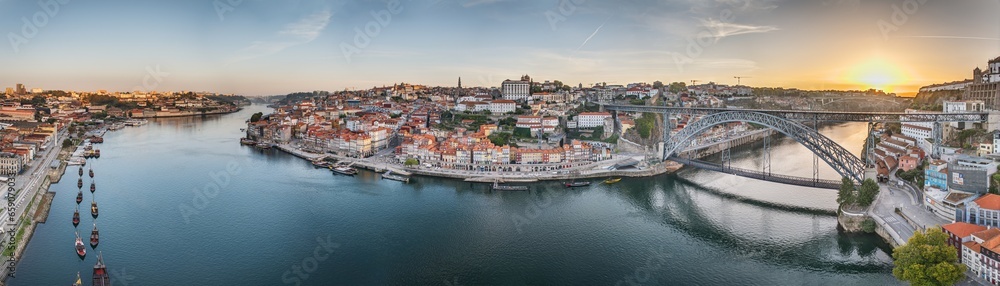 Drone panorama over the city of Porto and the Douro River at sunrise