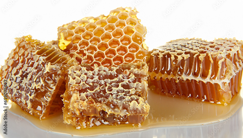 Honey and honeycomb on the white background. Honey and honeycomb on the white background.
