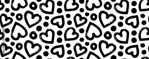 Abstract seamless banner design with brush drawn hearts and dots.