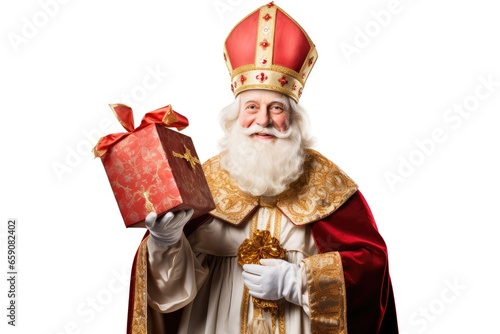 Foto Sinterklaas or Saint Nicholas with a gift isolated on a white background with ro
