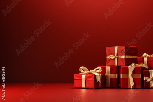 Wrapped gifts in festive red with golden ribbons for holiday celebrations and special occasions, generative ai © Phanida