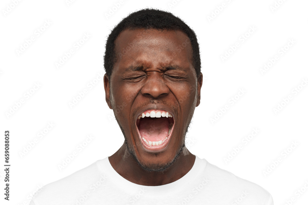 Close up portrait of screaming with closed eyes crazy african american man in blank white t-shirt isolated on gray background Close up portrait of screaming with closed eyes crazy african american man in blank white t-shirt isolated on gray background