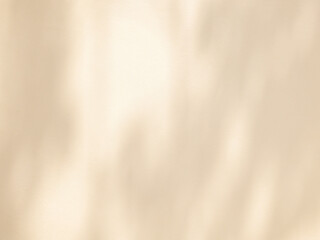 Abstract shadow of leaves in warm autumn colors on concrete wall texture background 