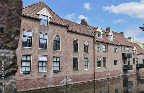 old houses on river, city canal 