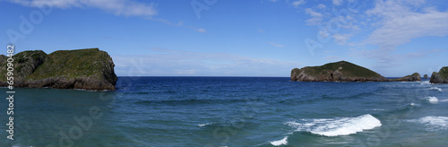  The islands on the beach of San Martin, Asturias coast, Cantabrian Sea. © poliki