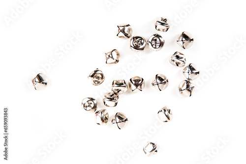 Φωτογραφία Scattered silver jingle bells isolated over white