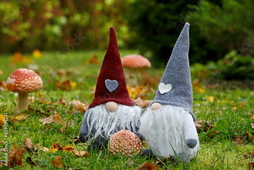 Two small textile goblins with red mushrooms