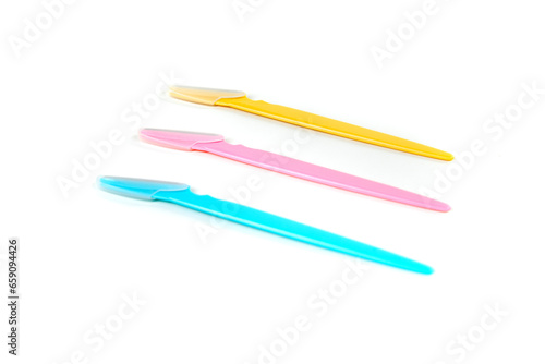 Blue pink and yellow disposable beauty shaving razor top down