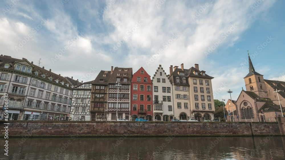 Strasbourg France time lapse 4K, city skyline timelapse at Ill River with colorful half timber house and Saint Nicolas Church Strasbourg France time lapse 4K, city skyline timelapse at Ill River with colorful half timber house and Saint Nicolas Church