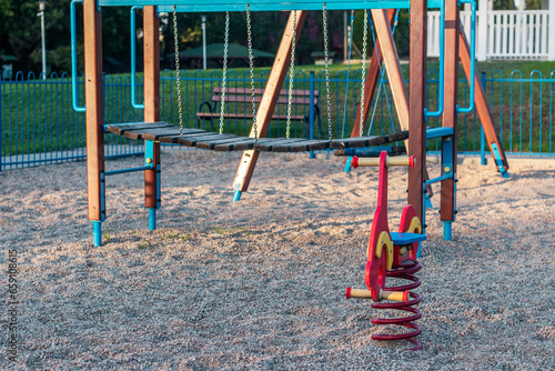 Obraz na płótnie Local children's playground by the setting sun. w salonie