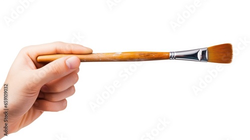 Hand Holding Art Paint Brush in Isolated White Background