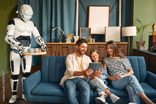 Fotografie Robot with family at home