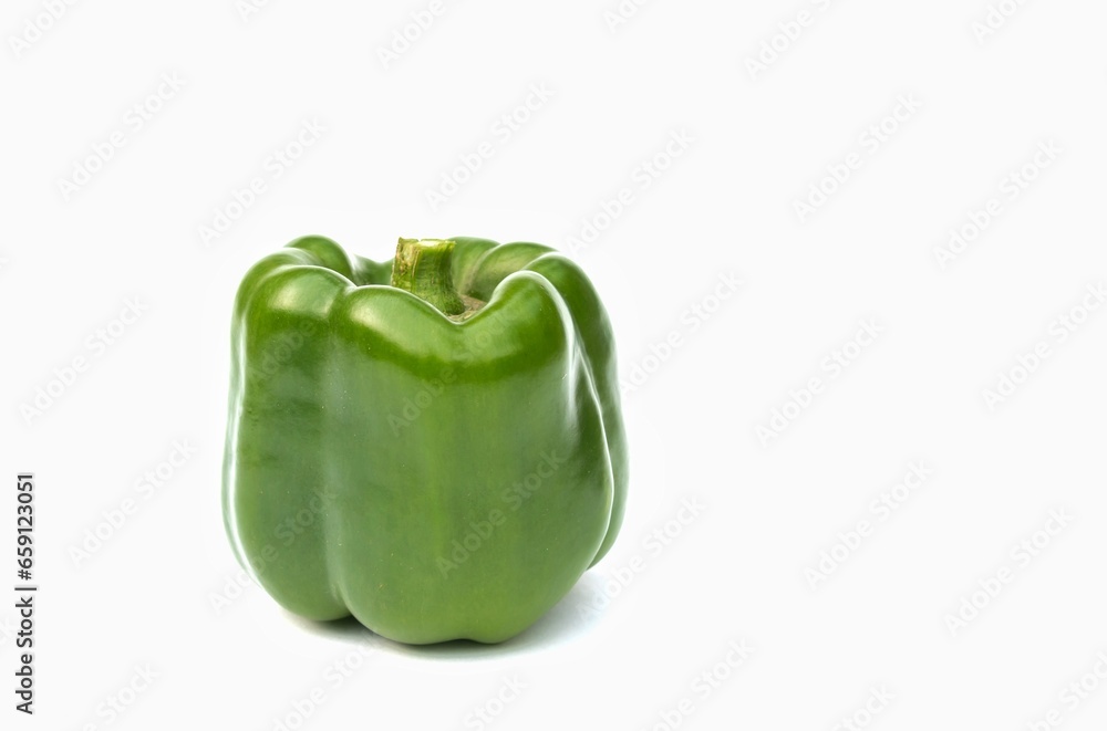 Closeup of Capsicum or Bell Pepper Isolated on White Background with Copy Space Closeup of Capsicum or Bell Pepper Isolated on White Background with Copy Space