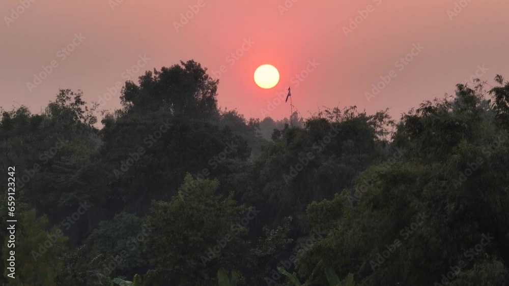 The sun dips below the horizon, casting a fiery glow across the sky. It is a moment of peace and tranquility, as the world bids farewell to another day. Sunset, Dusk, Aerial, Drone The sun dips below the horizon, casting a fiery glow across the sky. It is a moment of peace and tranquility, as the world bids farewell to another day. Sunset, Dusk, Aerial, Drone