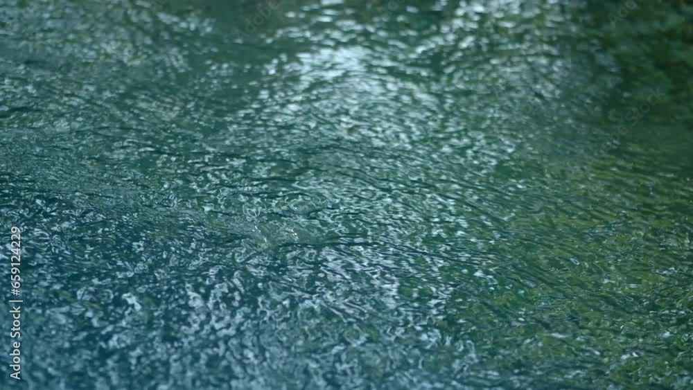 Blue water waves surface close up in swimming pool, background with copy space. Blue water waves surface close up in swimming pool, background with copy space.