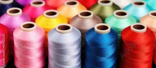 Assorted threads in spools of vibrant colors