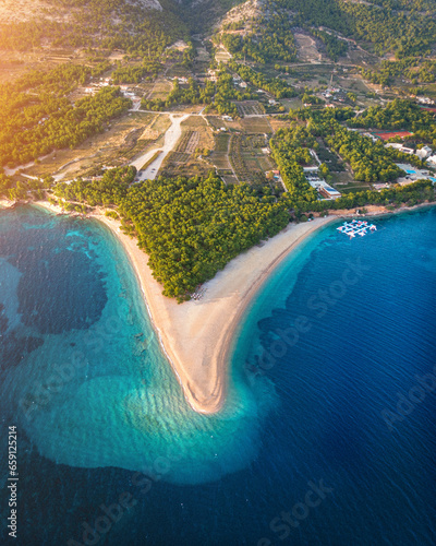 Coastline of Brac, Croatia during sunset with the golden horn beach called Zlatni Rat in the center © SmallWorldProduction