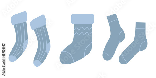 Pair of warm wool socks with ornament pattern. Winter woolen feet clothes. Cute cozy cotton foot apparel. Trendy hosiery design. Flat vector illustration isolated on white background