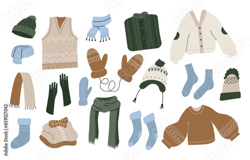 Collection of winter autumn cozy clothes and outerwear isolated on white background - woolen jumper, cardigan, socks, scarf, hat, mittens. Bundle of seasonal clothing. Colorful vector illustration.