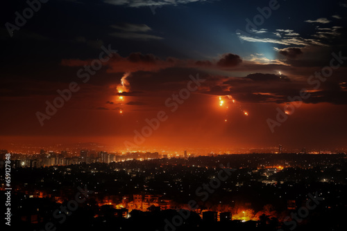 Nighttime skyline lit by flares during military operations in Israel 