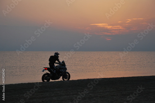 Motocross at dawn on the beach