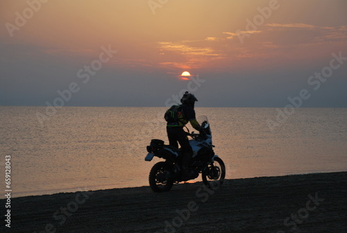 Motocross at dawn on the beach © Francesca