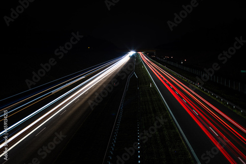 Traffic in motion blur. Traffic on highway at night. © Leszek Szelest