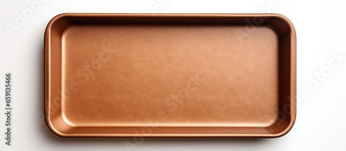White background brown parchment paper baking sheet empty oven tray rectangular baking pan nonstick utensils top view photo