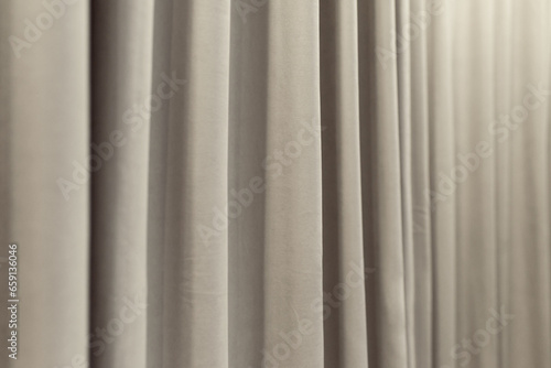 White curtain that dropped down as a straight line. Background for inserting text, empty spaces.