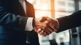 businessman handshake for teamwork of business merger and acquisition 