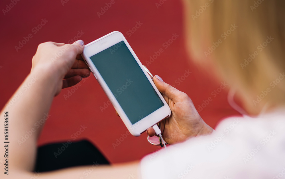 Anonymous woman messaging on smartphone Anonymous woman messaging on smartphone