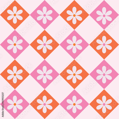 Retro white flowers on pink and orange Harlequin diamond shapes seamless pattern. For fabric, textile and home décor. 