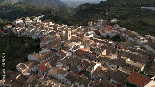 Aerial view Mountain landscape in old town Tarbena, tilt down, Alicante, Spain