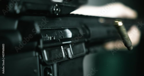 Ultra-Slow 800fps Detail of Bullet Exiting Assault Rifle, Multiple Shots in High-Resolution Close-Up, bullets flying in the air from chamber