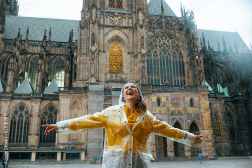 Photography woman in Prague having walking tour and rejoicing
