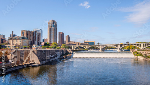 Cityscape with I-35W bridge over Mississippi river and Saint Anthony Falls. Minnesota, Midwest USA photo