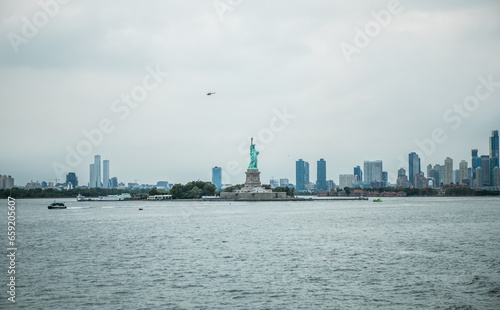 Beautiful view of Statue of Liberty on Liberty island in New York in Hudson river delta. © Maria