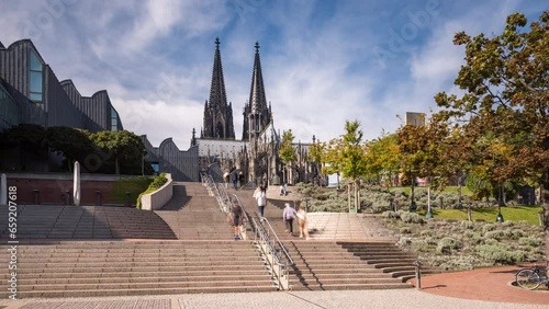 Cologne cathedral (dom) dome church time lapse hyperlapse in front of cologne germany cathedral. photo