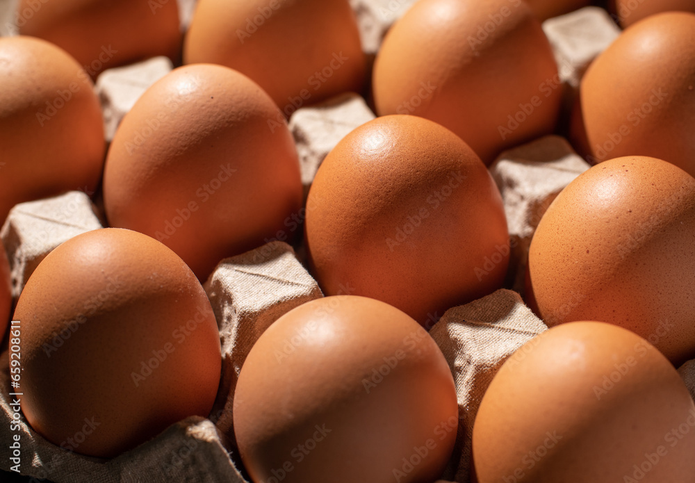 Close-up image of organic chicken eggs of the food ingredients on the restaurant table in the kitchen for cooking. Organic chicken eggs food ingredients concept. Close-up image of organic chicken eggs of the food ingredients on the restaurant table in the kitchen for cooking. Organic chicken eggs food ingredients concept.