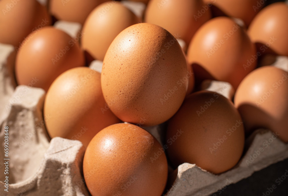 Close-up image of organic chicken eggs of the food ingredients on the restaurant table in the kitchen for cooking. Organic chicken eggs food ingredients concept. Close-up image of organic chicken eggs of the food ingredients on the restaurant table in the kitchen for cooking. Organic chicken eggs food ingredients concept.
